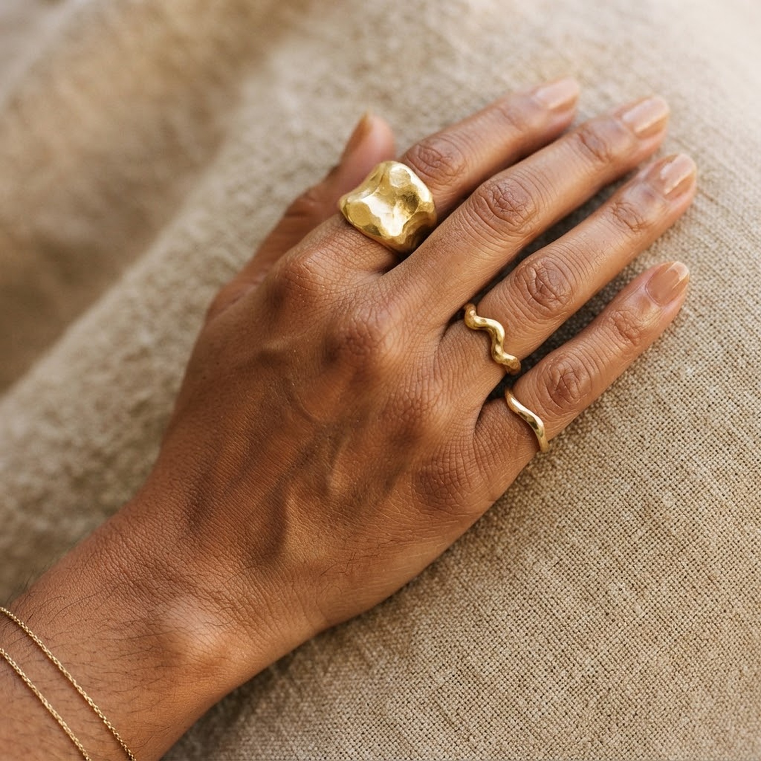 Macro photograph of hammered gold vermeil rings