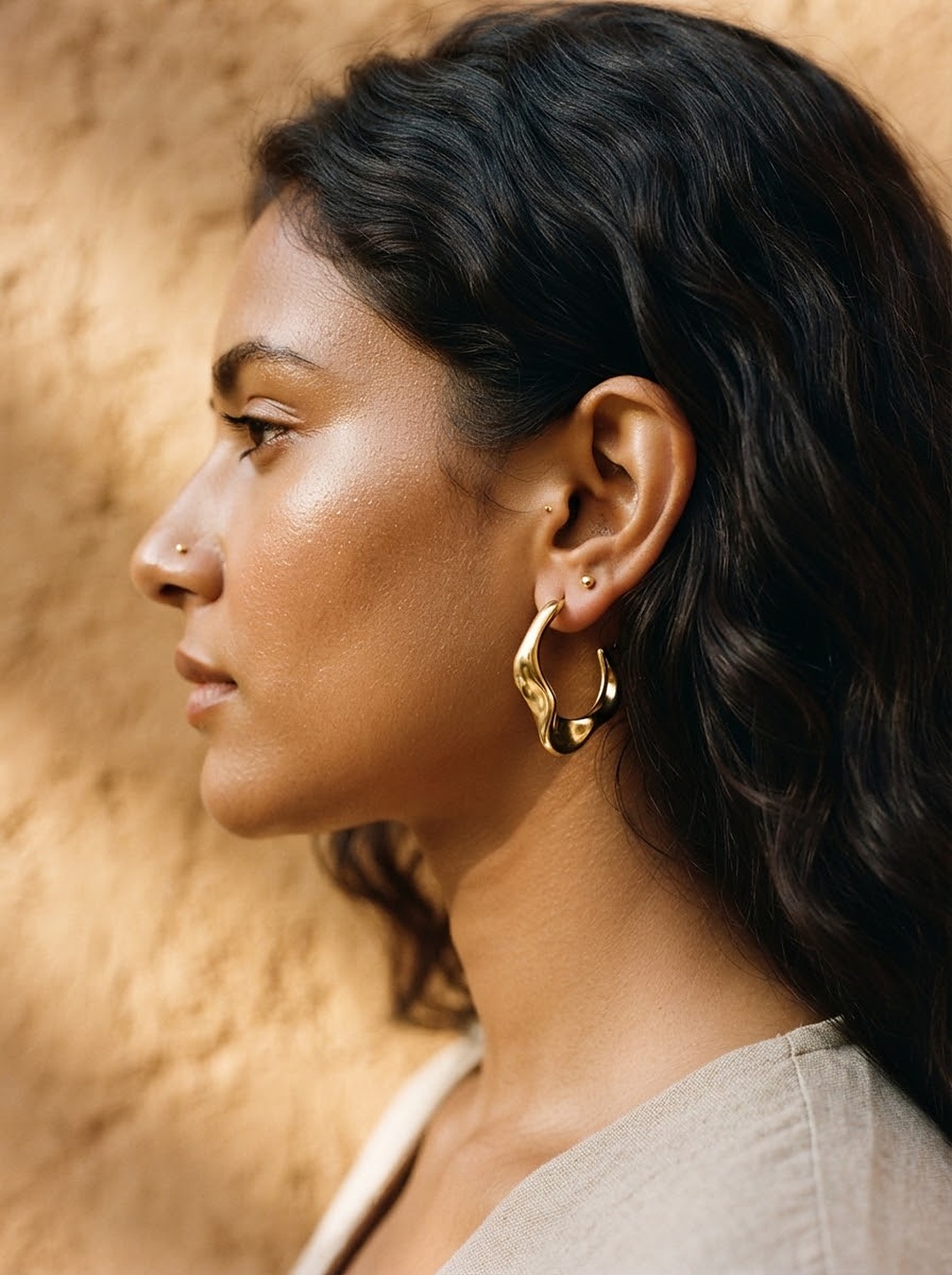 Sculpted Drop Earrings worn on body